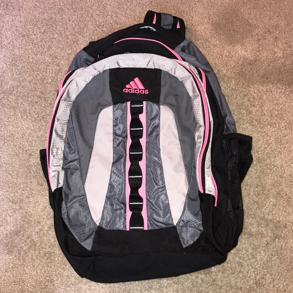 Grey black and pink backpack